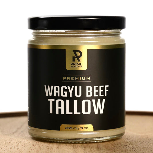 Jar of Prime Renders Wagyu beef tallow on a wooden surface